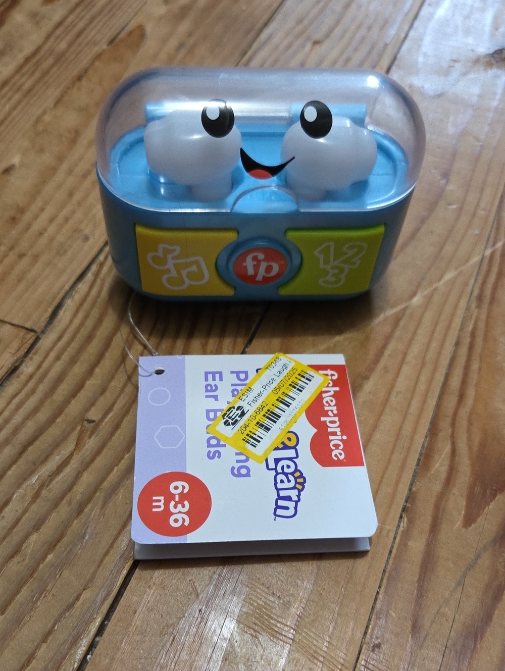Fisher-Price Light Blue Smiling Earbuds Play Toy